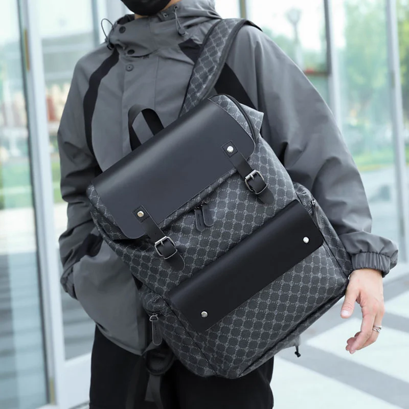 Guangzhou Fuliya Industry Co.,Ltd C-81363 Waterproof PU computer bag, zipper or drawstring closure, metal lock, large capacity, luggage pass-through, for business and travel.