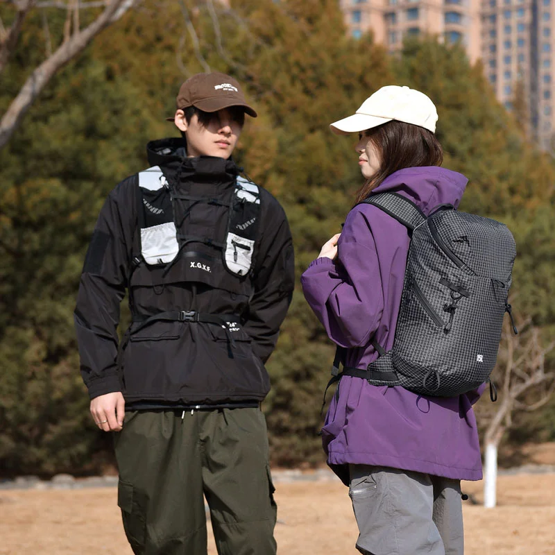 Guangzhou Fuliya Industry Co.,Ltd C-81473 Lightweight water-repellent hiking pack with hydration, pole attachment, whistle, reflective strips, and pockets - for hiking, cycling, travel.
