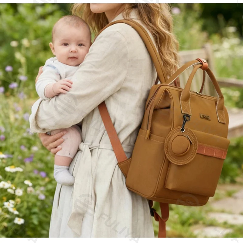 Guangzhou Fuliya Industry Co.,Ltd C-81475 Simple mommy backpack, water-repellent and breathable fabric, hidden rear pocket for valuables, built-in foil insulated pouch, large capacity with multiple compartments - easy for outings.