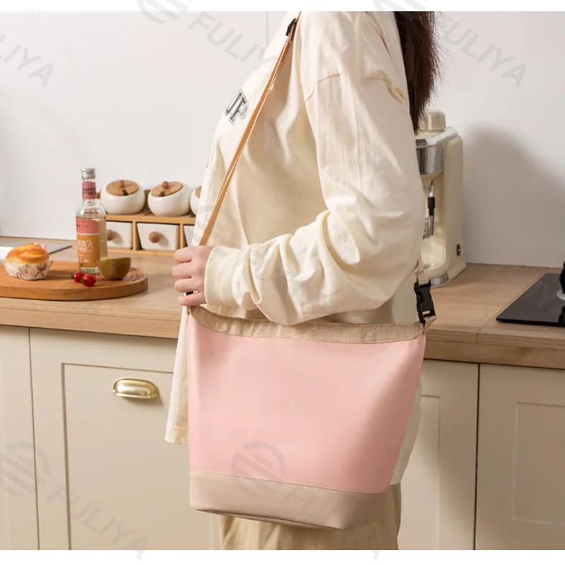 Guangzhou Fuliya Industry Co.,Ltd C-81109 Crossbody hand-carry lunch bag, 3-layer thickened insulation, waterproof fabric, anti-slip shoulder strap, and comfortable handle - crossbody or hand carry for office, picnics, and travel.