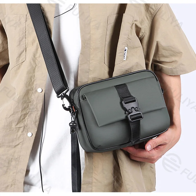 Guangzhou Fuliya Industry Co.,Ltd C-81113 Men's crossbody bag, water-resistant, large capacity, front compartment, back pocket, and adjustable strap - hand, shoulder, or crossbody carry for business, commuting, and daily use.
