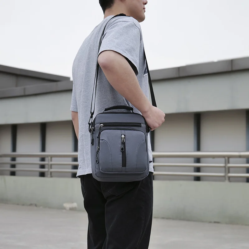 Guangzhou Fuliya Industry Co.,Ltd C-81163 Multi-pocket shoulder/crossbody bag, wear-resistant Oxford fabric, lightweight, hidden back zipper pocket, D-ring, detachable hook, and adjustable strap - for commuting, travel, and daily use.