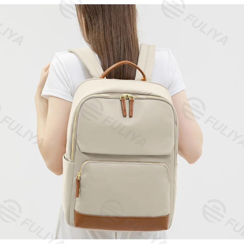 Guangzhou Fuliya Industry Co.,Ltd C-81172 Large-capacity backpack, water-resistant, multi-layer storage, front zipper pocket, side pocket, hidden zipper pocket, laptop compartment, and luggage strap - for school, commuting, and travel.
