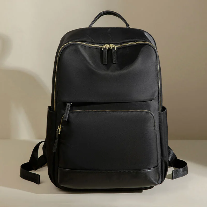 Guangzhou Fuliya Industry Co.,Ltd C-81172  Large-capacity backpack, water-resistant, multi-layer storage, front zipper pocket, side pocket, hidden zipper pocket, laptop compartment, and luggage strap - for school, commuting, and travel.
