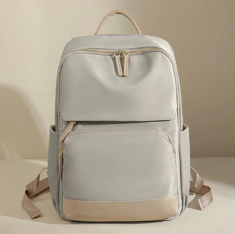 Guangzhou Fuliya Industry Co.,Ltd C-81172  Large-capacity backpack, water-resistant, multi-layer storage, front zipper pocket, side pocket, hidden zipper pocket, laptop compartment, and luggage strap - for school, commuting, and travel.