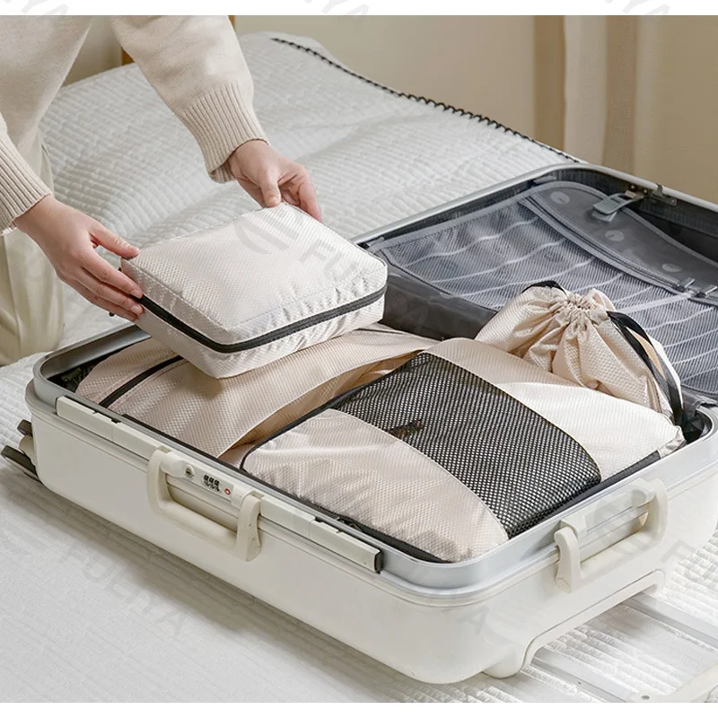 Guangzhou Fuliya Industry Co.,Ltd C-81190  Compression travel organizer set, water-resistant, see-through mesh, compression zipper, clothing bags, shoe bag, drawstring bag, and cosmetic pouch - for travel, business trips, and organization.