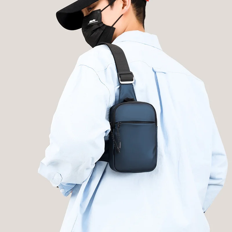 Guangzhou Fuliya Industry Co.,Ltd C-81208 Lightweight waterproof men's crossbody bag, multi-compartment storage, swivel quick-release buckle, adjustable strap and comfortable handle - wear as chest or crossbody for commuting, cycling, and sports.