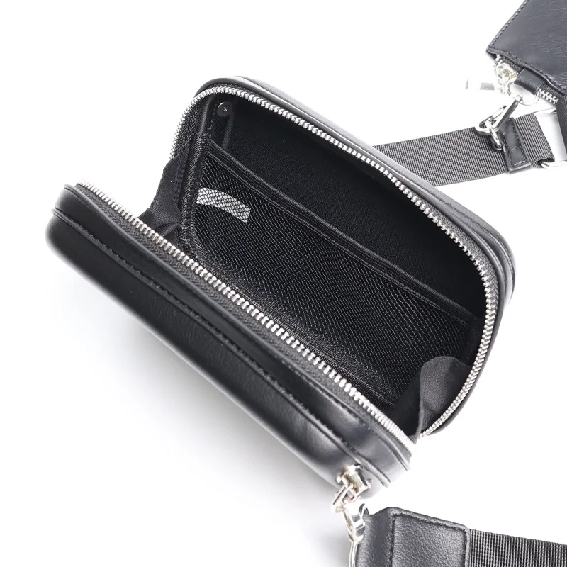 Guangzhou Fuliya Industry Co.,Ltd C-81212 Korean-style men's mini box bag, crossbody, smooth zipper, metal hardware, adjustable strap, and detachable pouch - for daily and casual use.