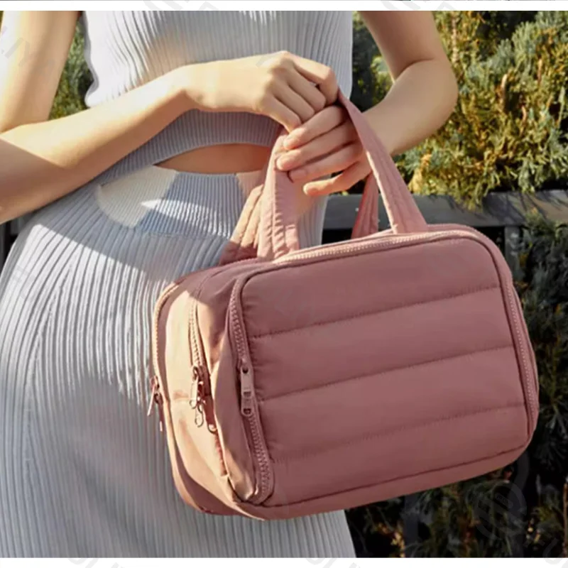 Guangzhou Fuliya Industry Co.,Ltd C-81218 Light luxury hand-carry makeup bag, wet/dry separation, multi-compartment, water-repellent nylon, elastic brush bands, luggage sleeve - for travel and daily use.