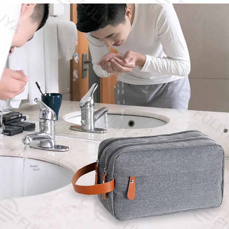 Guangzhou Fuliya Industry Co.,Ltd C-81222 Large-capacity toiletry bag, dual main compartments, leather handle, smooth zipper, and mesh pocket - carry or hang, for travel and daily use.