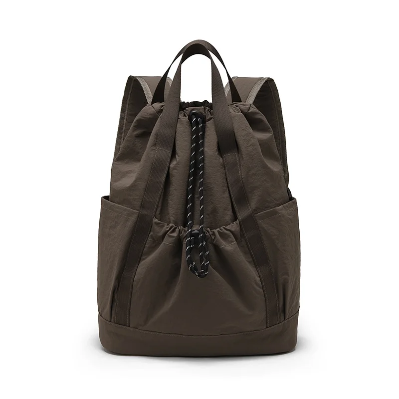 Guangzhou Fuliya Industry Co.,Ltd C-81238 Lightweight waterproof nylon drawstring backpack, large main compartment, magnetic front pocket, back zipper pocket, side pocket, adjustable straps, and comfortable handle - for cycling, gym, college, and sports.