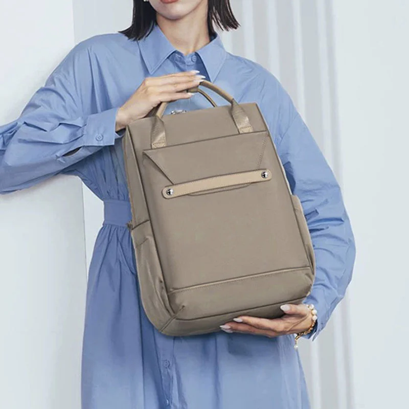 Guangzhou Fuliya Industry Co.,Ltd C-81242 Women's casual backpack, water-repellent, large capacity with compartments, laptop sleeve, front zipper pocket, card slot, side pockets, and luggage strap - for daily, travel, and school.