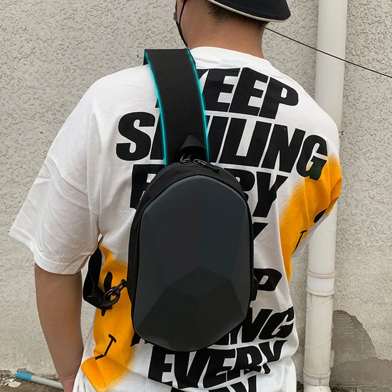 Guangzhou Fuliya Industry Co.,Ltd C-81247 Hard-shell chest bag, water-resistant, large capacity, USB charging port and adjustable strap - for cycling, travel, and daily use.