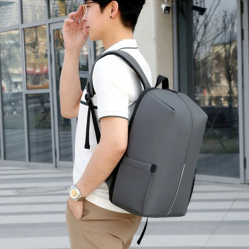 Guangzhou Fuliya Industry Co.,Ltd C-81252 Business large-capacity backpack, water-resistant and durable, laptop compartment, luggage sleeve, reflective strip, and honeycomb breathable back panel - for commuting, business trips, and travel.