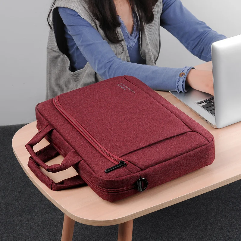 Guangzhou Fuliya Industry Co.,Ltd C-81255 Laptop handbag, water-resistant and scratch-resistant, fleece-lined shock absorption, front/back zipper pockets, trolley sleeve, and detachable shoulder strap - for commuting, business trips, and daily use.