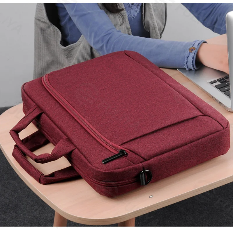 Guangzhou Fuliya Industry Co.,Ltd C-81255 Laptop handbag, water-resistant and scratch-resistant, fleece-lined shock absorption, front/back zipper pockets, trolley sleeve, and detachable shoulder strap - for commuting, business trips, and daily use.