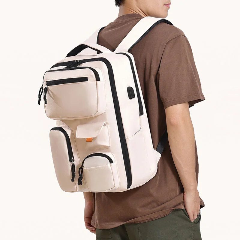 Guangzhou Fuliya Industry Co.,Ltd C-81263 Multi-functional backpack, water-resistant and scratch-resistant, 180° full-open, large capacity with compartments, laptop sleeve, USB port, and luggage strap - for commuting, business trips, and school.