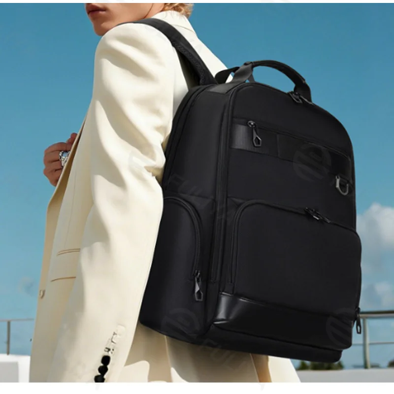 Guangzhou Fuliya Industry Co.,Ltd C-81266 Business commuter backpack, large capacity, laptop compartment, anti-theft back pocket, trolley sleeve, and breathable back panel - for commuting, business trips, and travel.