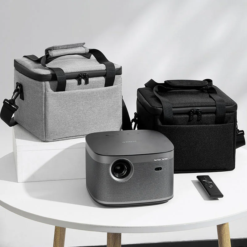 Guangzhou Fuliya Industry Co.,Ltd C-81271 Projector hand-carry storage bag, water-resistant and scratch-resistant, thick foam handle, removable divider, hidden pocket, and mesh pocket, soft lining for dust protection.