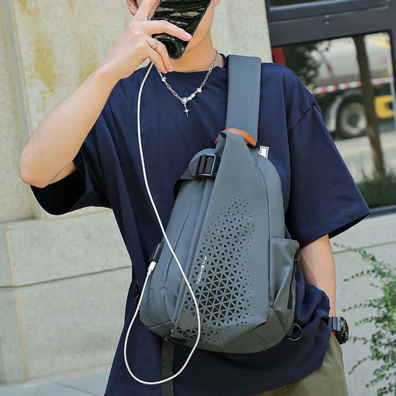 Guangzhou Fuliya Industry Co.,Ltd C-81278 Utility crossbody bag, large capacity, comfortable handle, breathable strap, front zipper and side slip pockets - shoulder, crossbody, or hand carry for motorcycling, cycling, and daily use.