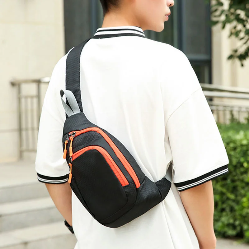 Guangzhou Fuliya Industry Co.,Ltd C-81282 Sports casual chest bag, multi-pocket large capacity, handle, breathable back panel, elastic side pocket, and front zipper pocket - shoulder, crossbody, or hand carry.