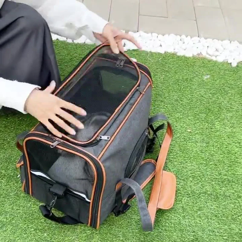 Guangzhou Fuliya Industry Co.,Ltd C-81287 Portable pet carrier, fits airline under-seat, breathable mesh, easy snap buckle, smooth zipper, widened shoulder pad, and reflective strip - for cats, small dogs, and travel.