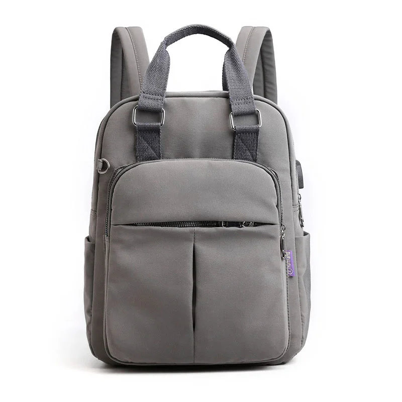 Guangzhou Fuliya Industry Co.,Ltd C-81288 Lightweight waterproof backpack, large capacity with pockets, built-in USB charging cable, anti-theft back pocket, metal D-ring, and adjustable strap - luggage pass-through for campus, commuting, and travel.