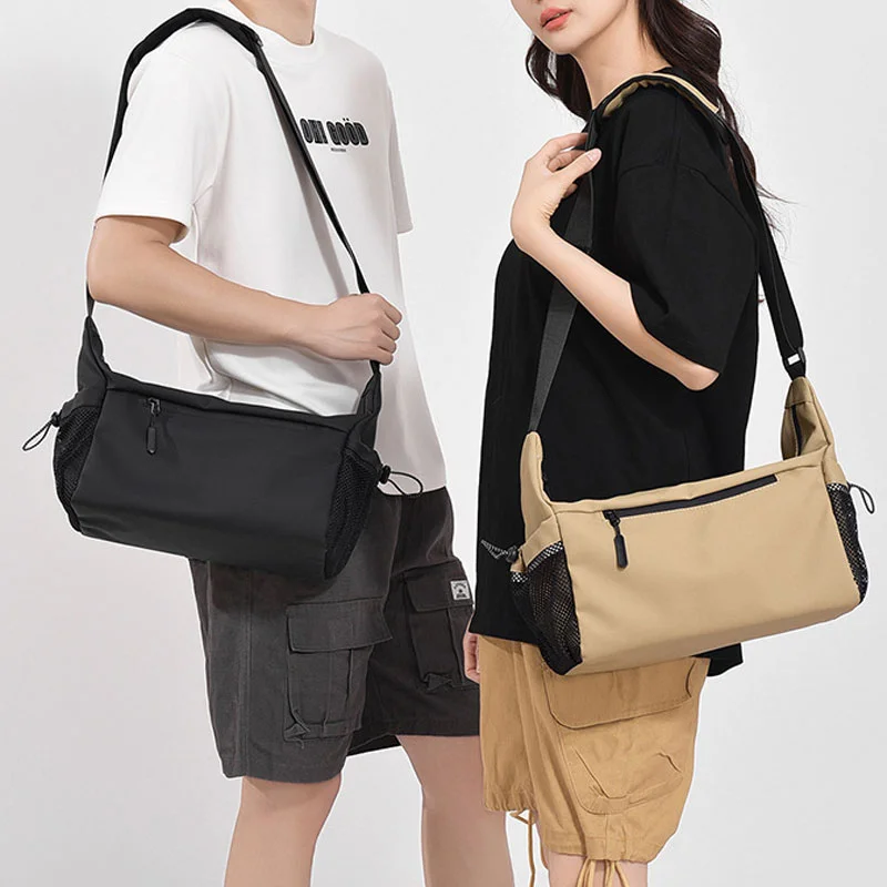 Guangzhou Fuliya Industry Co.,Ltd C-81292 Waterproof crossbody bag, large capacity with compartments, main pocket, zipper pocket, document pocket, and elastic side pocket, adjustable buckle - for commuting, business, and daily use.