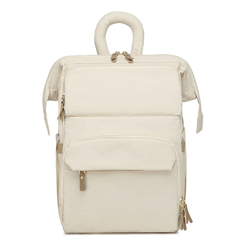 Guangzhou Fuliya Industry Co.,Ltd C-81299  Mommy backpack, water-resistant, large capacity, insulated bottle compartment, wide-opening main pocket, side tissue pocket, and comfortable handle - for baby outings.