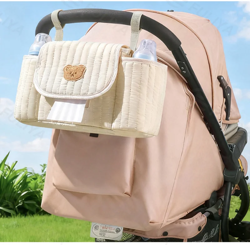 Guangzhou Fuliya Industry Co.,Ltd C-81300 Universal stroller organizer, embroidered flap, dual bottle pockets, front tissue dispenser, back anti-theft pocket, hook-and-loop mounting, compartment storage - for baby outings.