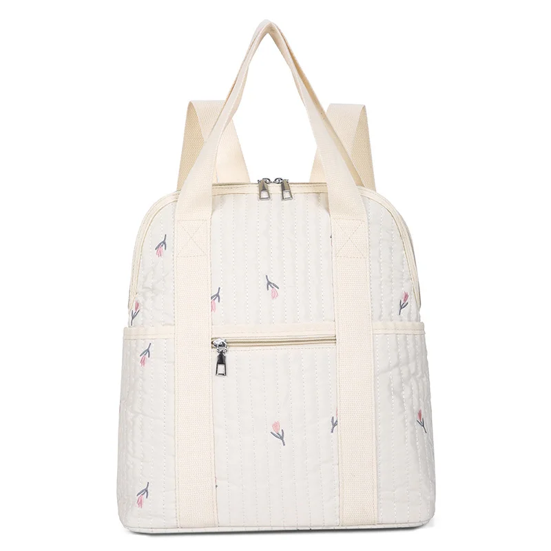 Guangzhou Fuliya Industry Co.,Ltd C-81301 Lightweight waterproof embroidered mommy backpack, luggage sleeve, wide opening, multi-pockets - for baby outings and travel.