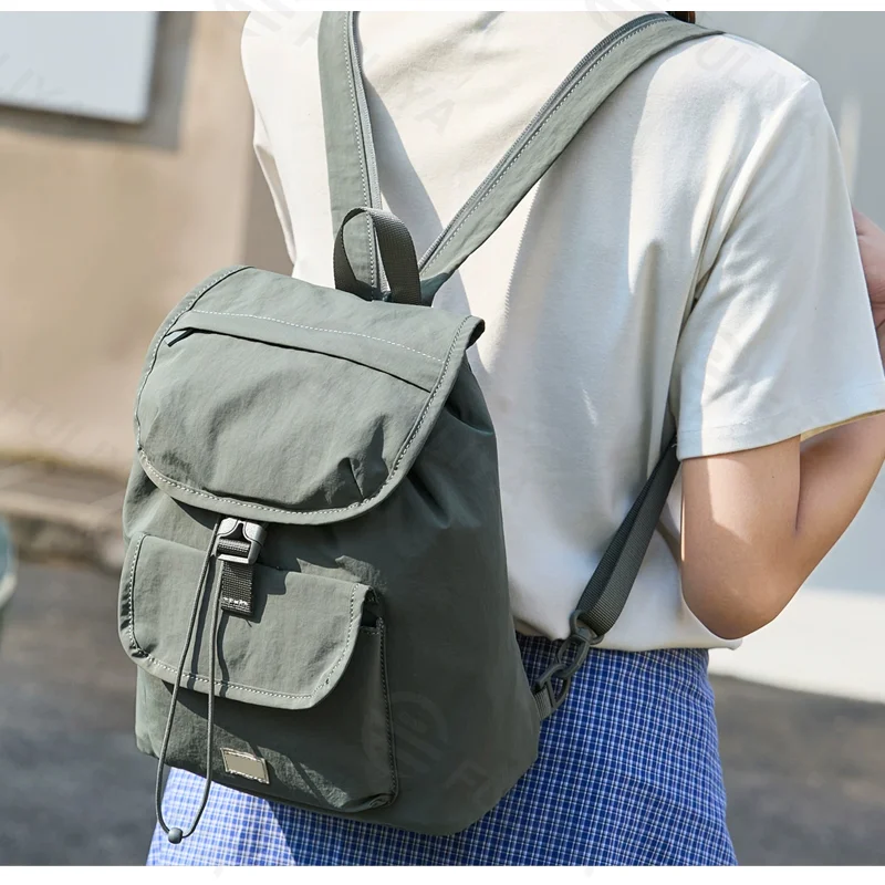Guangzhou Fuliya Industry Co.,Ltd C-81319 Ultra-light outdoor mini backpack, convertible crossbody/backpack, drawstring closure, water-repellent and scratch-resistant, large capacity with multiple pockets - for outdoor and daily.
