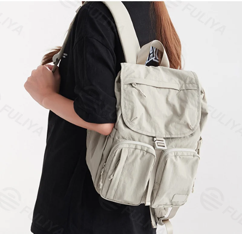 Guangzhou Fuliya Industry Co.,Ltd C-81320 Lightweight multi-pocket backpack, water-repellent fabric, wide-opening main compartment, top zipper pocket, non-slip chest buckle, available in S/L sizes - suitable for commuting, travel, and daily use.