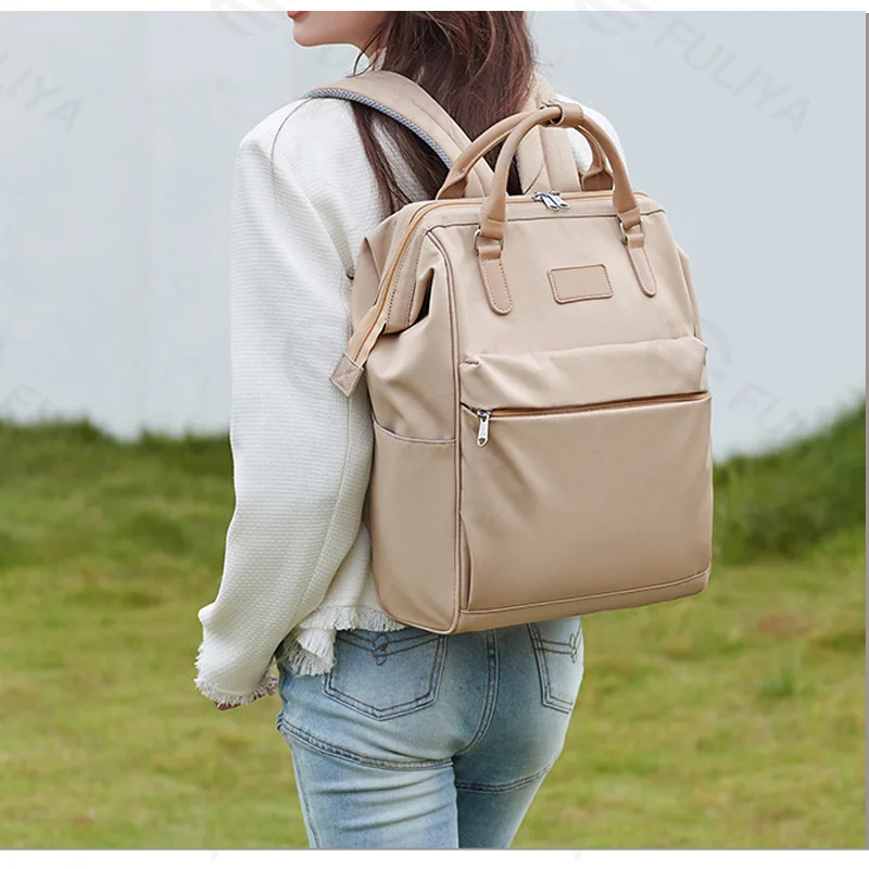 Guangzhou Fuliya Industry Co.,Ltd C-81321 Large-capacity backpack, multi-layer storage, built-in laptop compartment, luggage pass-through sleeve, wide shoulder straps and comfortable handle - suitable for commuting, travel, and daily use.