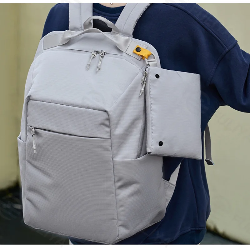 Guangzhou Fuliya Industry Co.,Ltd C-81330 Large-capacity main compartment, thickened breathable shoulder straps, detachable zipper pouch, back luggage sleeve, multi-functional pockets - ideal for commuting, travel, and school.