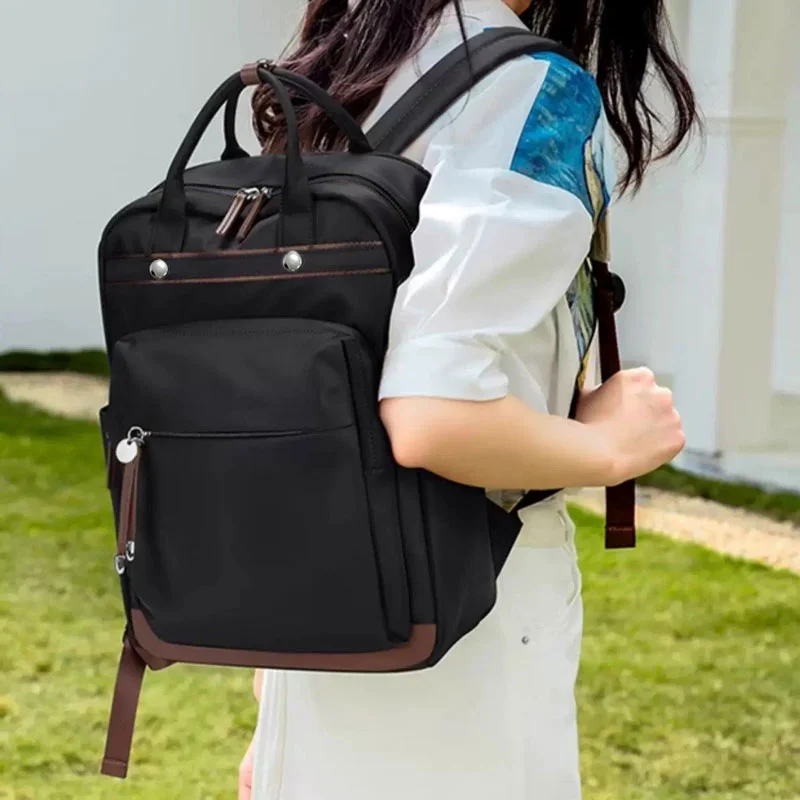 Guangzhou Fuliya Industry Co.,Ltd C-81353 This waterproof backpack features scientific layering, a separate laptop compartment, large-capacity main compartment, back anti-theft zipper, and rivet reinforcement - ideal for commuting, school, and weekends.
