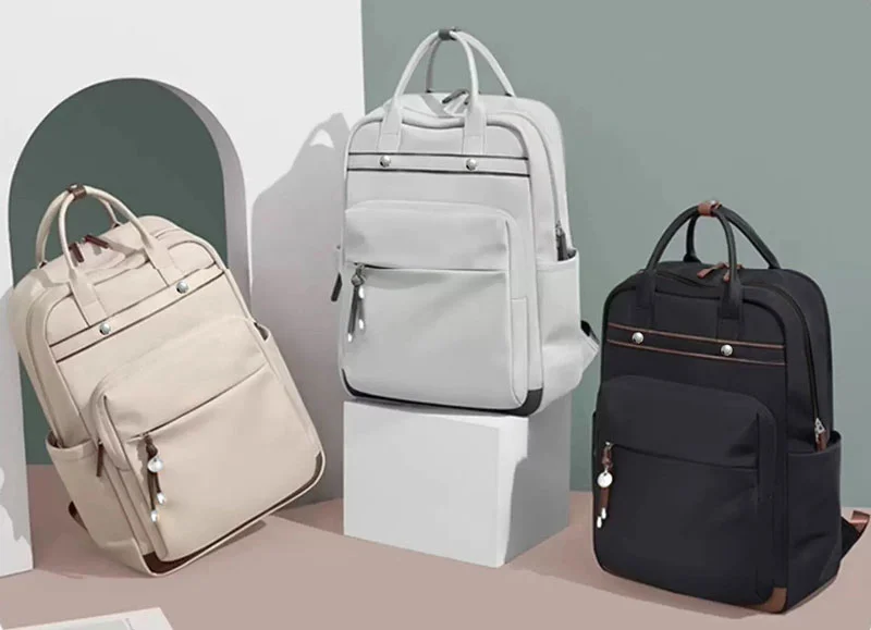 Guangzhou Fuliya Industry Co.,Ltd C-81353 This waterproof backpack features scientific layering, a separate laptop compartment, large-capacity main compartment, back anti-theft zipper, and rivet reinforcement - ideal for commuting, school, and weekends.