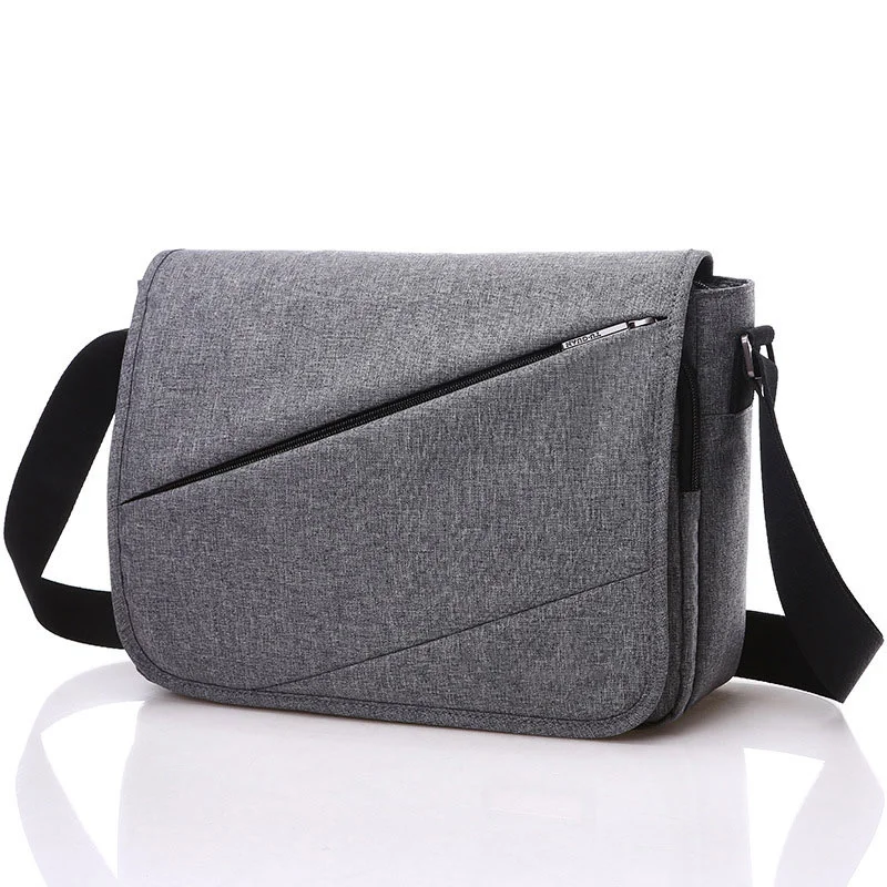 Guangzhou Fuliya Industry Co.,Ltd C-81378 This waterproof canvas crossbody bag is durable, large-capacity with multiple pockets and Velcro closure - perfect for commuting and daily use.