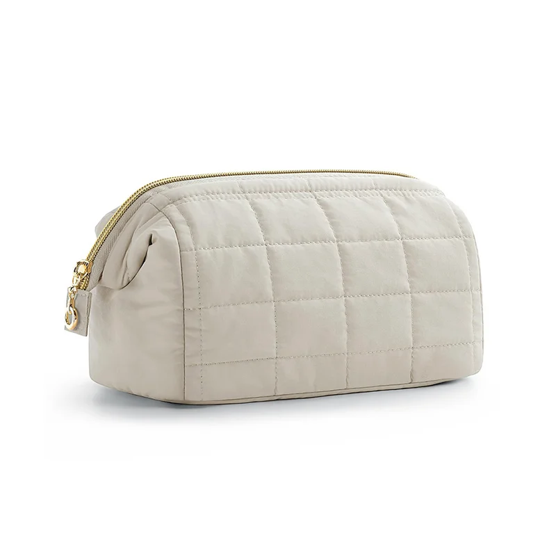 Guangzhou Fuliya Industry Co.,Ltd C-81395 Puffy padded makeup bag with wide opening, multi-compartments, PVC lining for easy cleaning, and water-resistant fabric - perfect for makeup, toiletries, and travel.
