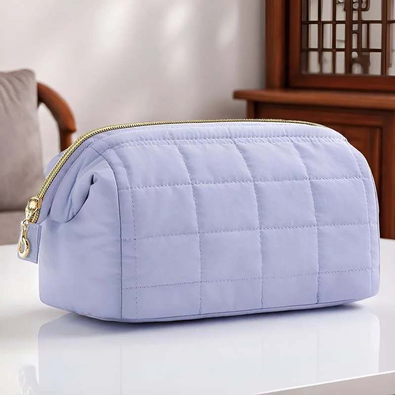 Guangzhou Fuliya Industry Co.,Ltd C-81395 Puffy padded makeup bag with wide opening, multi-compartments, PVC lining for easy cleaning, and water-resistant fabric - perfect for makeup, toiletries, and travel.
