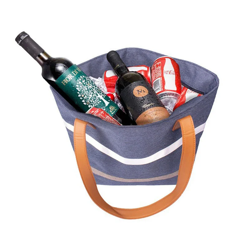 Guangzhou Fuliya Industry Co.,Ltd C-81396 Reusable striped thermal lunch tote. Compact exterior with spacious interior for lunch boxes, fruit, water bottles, and snacks. Reinforced handle for easy carry to office or picnic.