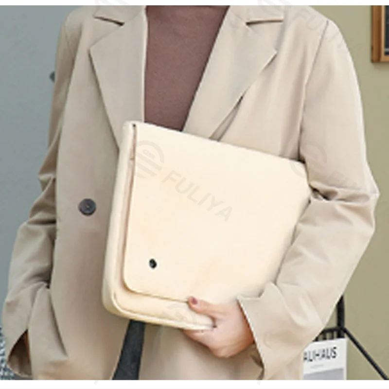 Guangzhou Fuliya Industry Co.,Ltd C-81399 This waterproof laptop sleeve features high-density durable fabric, multi-section storage, metal snap button closure, and 3 sizes (fits 11-15″ laptops) - ideal for commuting, school, and business trips.