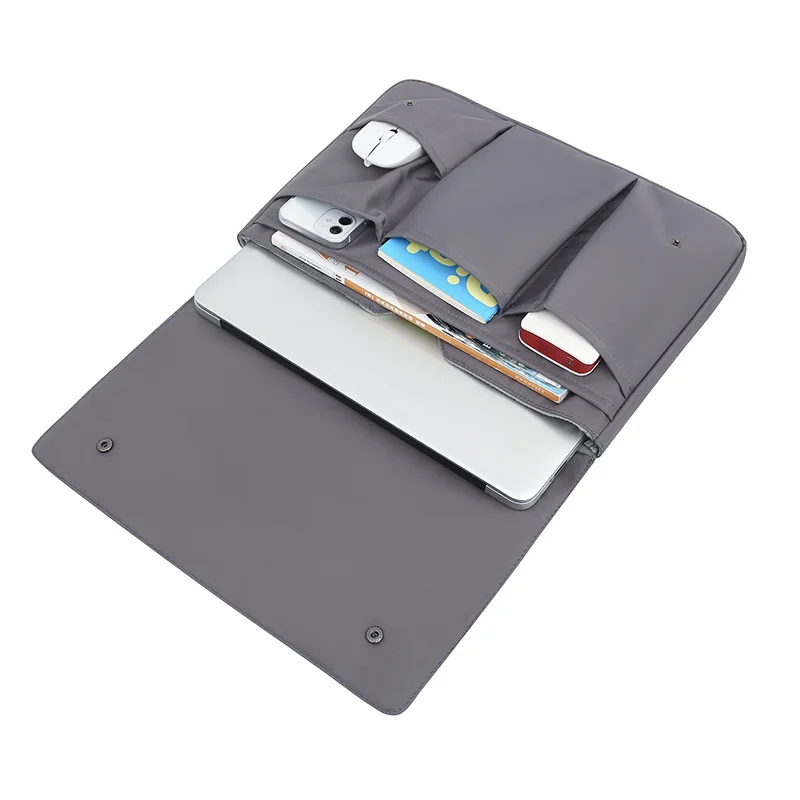 Guangzhou Fuliya Industry Co.,Ltd C-81399 This waterproof laptop sleeve features high-density durable fabric, multi-section storage, metal snap button closure, and 3 sizes (fits 11-15″ laptops) - ideal for commuting, school, and business trips.