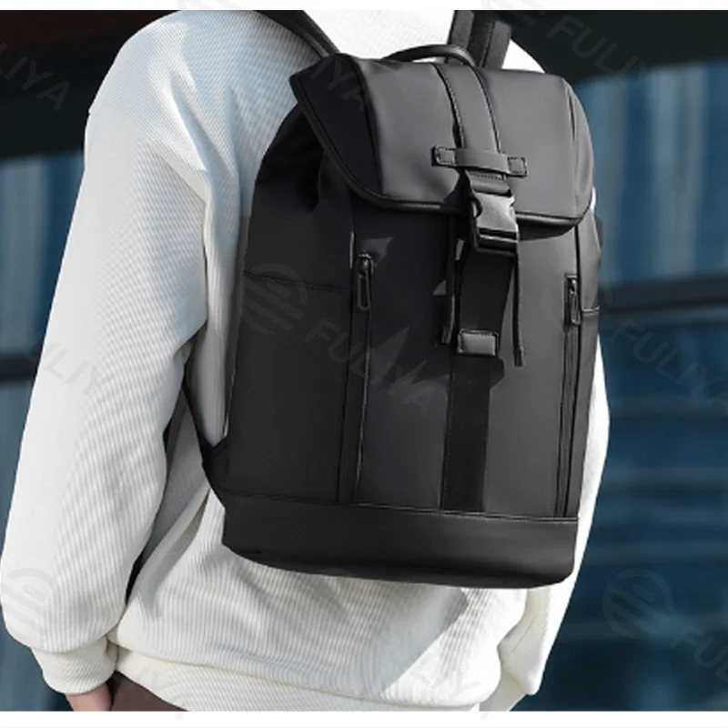 Guangzhou Fuliya Industry Co.,Ltd C-81429 This lightweight business backpack is water-repellent and durable, with large capacity and multiple pockets, plus a trolley strap - perfect for commuting and business trips.