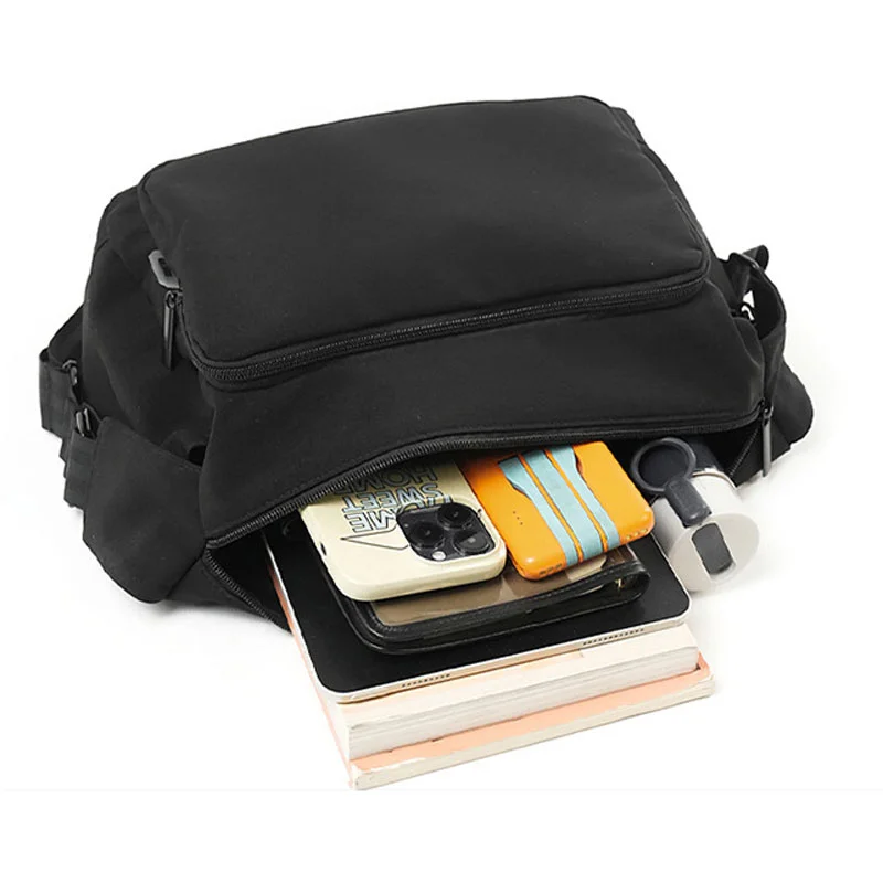 Guangzhou Fuliya Industry Co.,Ltd C-81435 This water-repellent shoulder bag has multi-layer pockets, an adjustable strap, and durable fabric - for commuting and outdoor use.