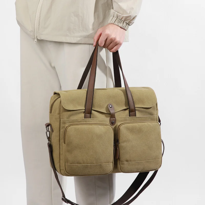 Guangzhou Fuliya Industry Co.,Ltd C-81445 This canvas bag is lightweight and soft, with hand/shoulder/crossbody carry, multi-layer pockets - for commuting and casual use.
