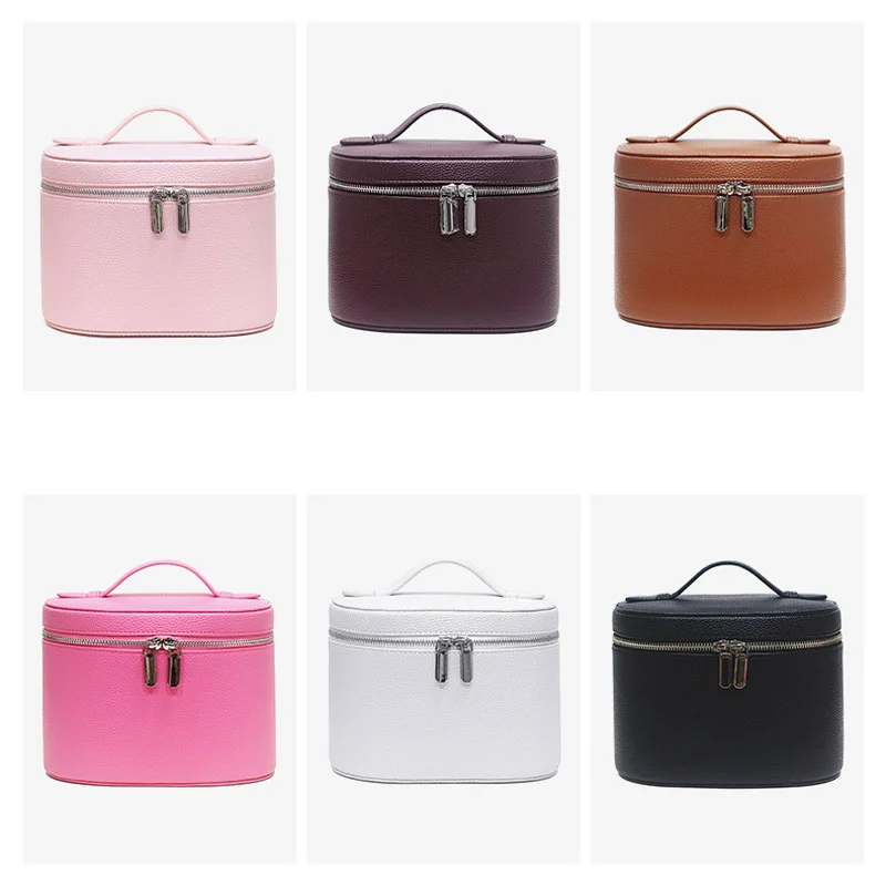 Guangzhou Fuliya Industry Co.,Ltd C-81454 This PU makeup bag features macaron colors, large capacity with compartments, smooth zipper and wide handle - for business trips, travel, and daily use.