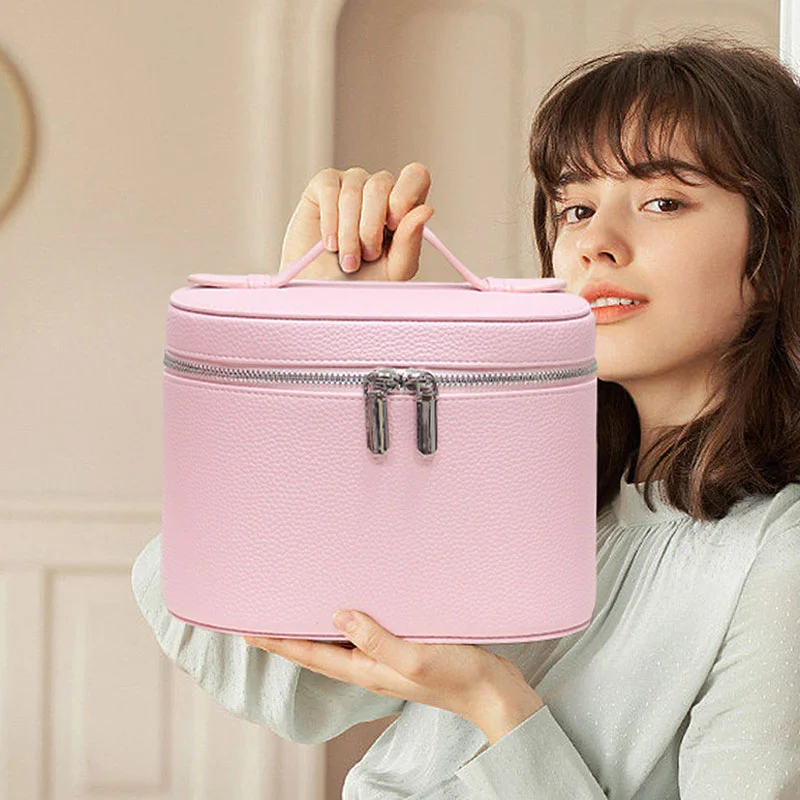 Guangzhou Fuliya Industry Co.,Ltd C-81454 This PU makeup bag features macaron colors, large capacity with compartments, smooth zipper and wide handle - for business trips, travel, and daily use.