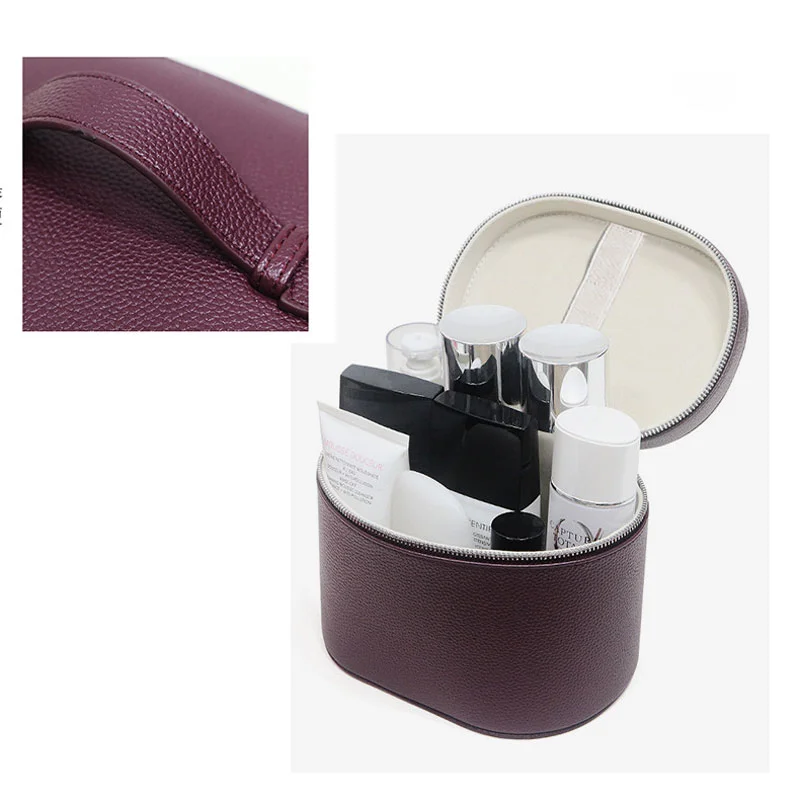 Guangzhou Fuliya Industry Co.,Ltd C-81454 This PU makeup bag features macaron colors, large capacity with compartments, smooth zipper and wide handle - for business trips, travel, and daily use.