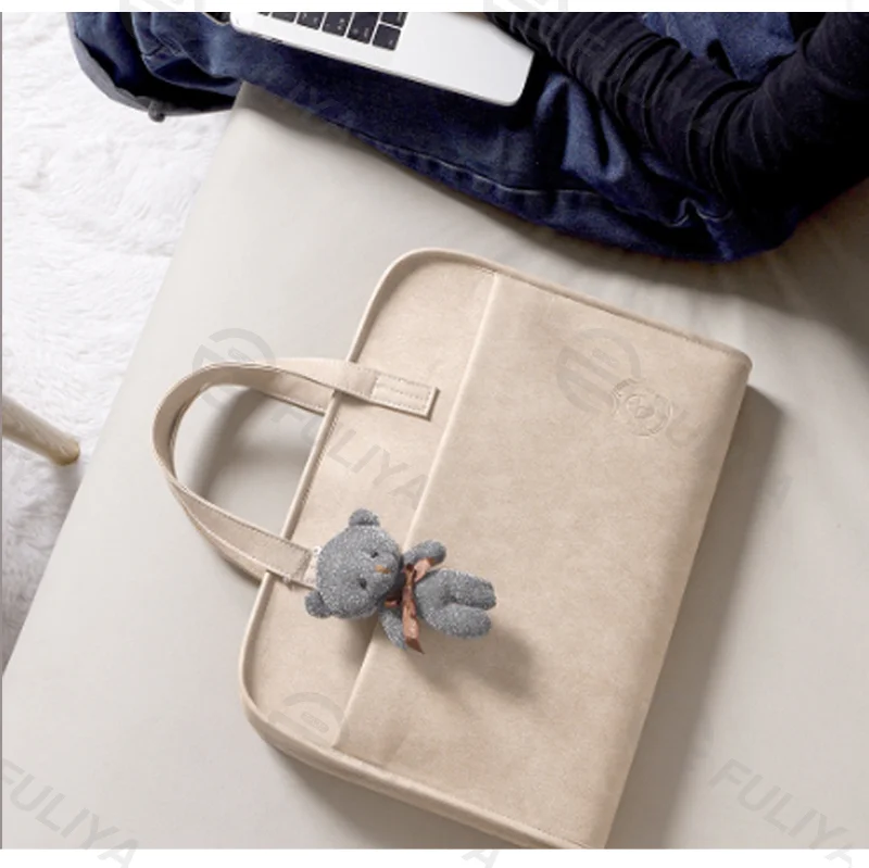 Guangzhou Fuliya Industry Co.,Ltd C-81459 This laptop bag is water-repellent and shockproof with 3-layer protection, multiple compartments, and hand/trolley/crossbody carry - for commuting and business trips.